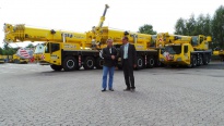 Claus Eisele übernimmt die neuen Terex Demag Krane von Michael Zieger.